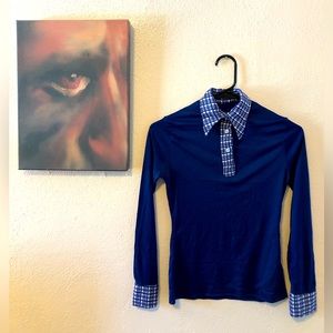 Vintage blue polyester collared sportswear shirt for women.